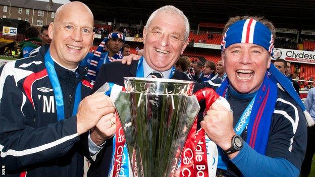 Rangers manager Walter Smith and assistants Kenny McDowall and Ally McCoist celebrate winning the Scottish Premier League title in May 2009