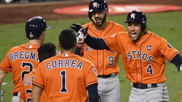 George Springer (right) celebrates his home run with Houston Astros team-mates