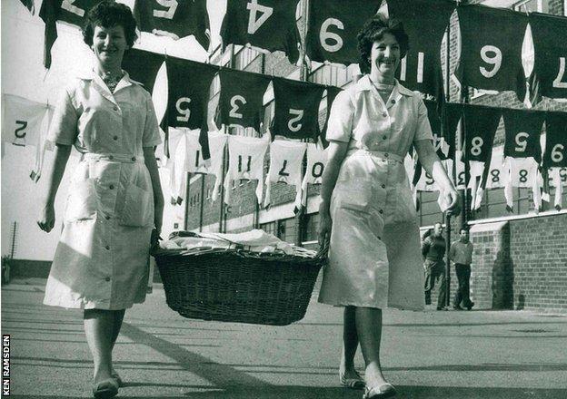 Ken Ramsden's mum and aunty hanging shirts outside Old Trafford