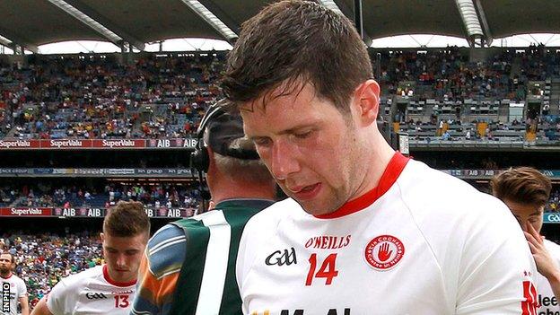 A dejected Sean Cavanagh walks off Croke Park after the quarter-final defeat by Mayo