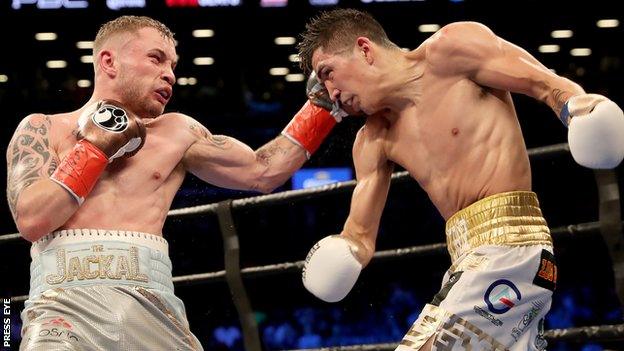 Carl Frampton lands a left hand on Leo Santa Cruz in their first contest last July