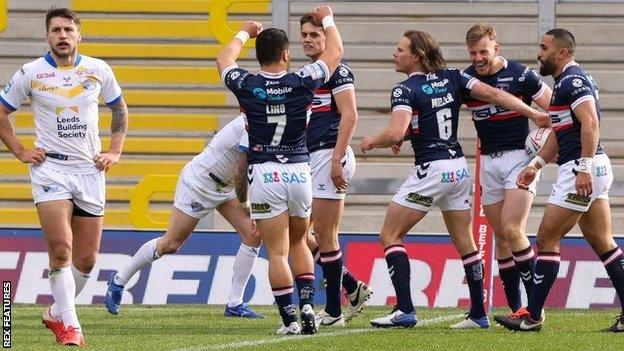 Wakefield winger Tom Johnstone twice went almost the full length of the field to score against Leeds at Headingley