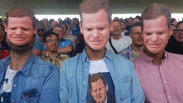 England fans wearing Steve Smith masks