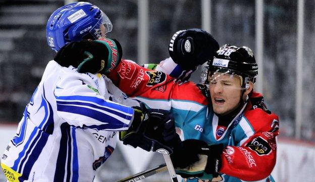 Coventry's Kevin Noble trades blows with Chris Higgins of the Belfast Giants