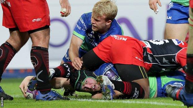 Connacht back-row Eoin McKeon stretches out to score a try against Oyonnax in Switzeland