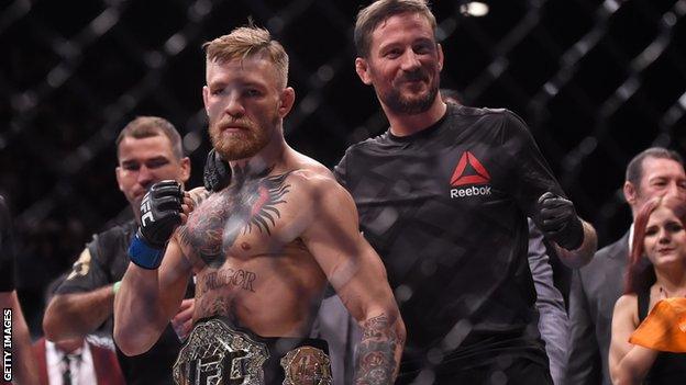 Conor McGregor and John Kavanagh after the victory over Jose Aldo in 2015