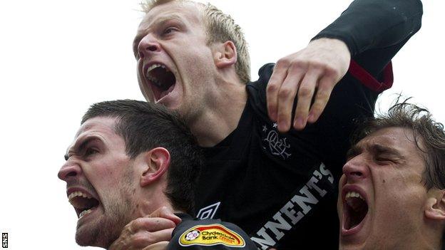 Steven Naismith (centre) celebrates a goal for Rangers with Kyle Lafferty (left) and Nikica Jelavic