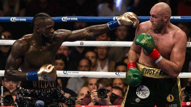 WBC world heavyweight champion Deontay Wilder (left) fights Tyson Fury (right)