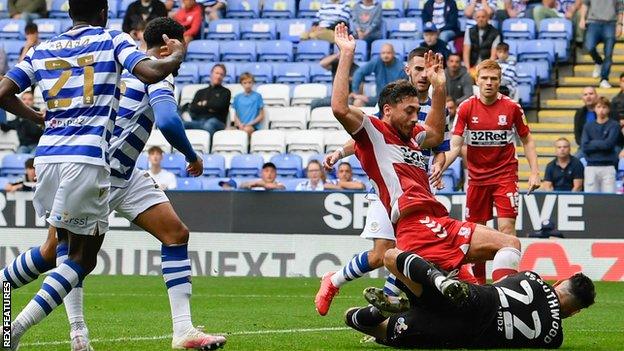 Matt Crooks (right) was sent off for his challenge for the ball with Reading keeper Luke Southwood in the 87th minute of Middlesbrough's defeat on Saturday