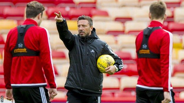 Aberdeen manager Derek McInnes takes training at Pittodrie