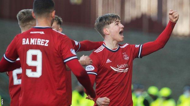 Adam Montgomery celebrates with Aberdeen