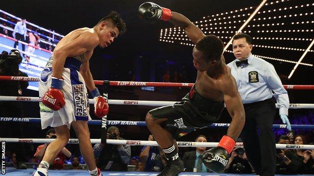 Emanuel Navarrete (left) lands a punch on Isaac Dogboe.