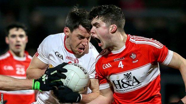 Mattie Donnelly and Mark Lynch in action at Pairc Esler