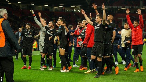 Sevilla players celebrate