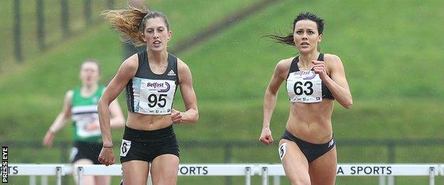 Jess Turner (left) battles with Christine McMahon in the women's 400m hurdles