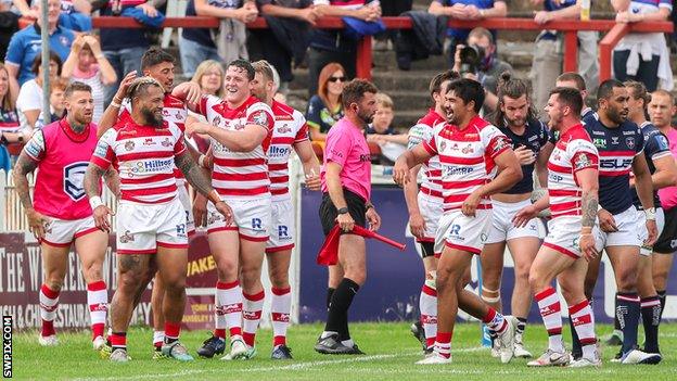 Leigh Centurions celebrate a defensive effort