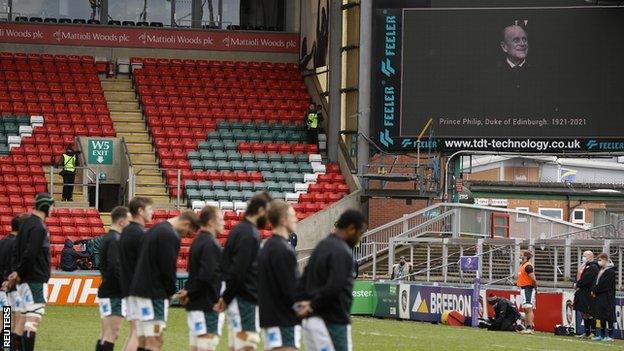 General view of rugby players during a two minute silence for Prince Philip