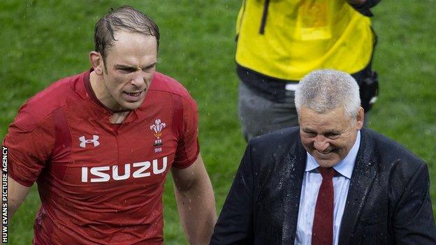 Alun Wyn Jones and Warren Gatland on the Principality Stadium pitch after the 2019 Grand Slam win against Ireland