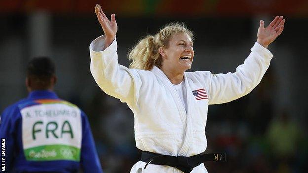 Kayla Harrison celebrates winning a judo match