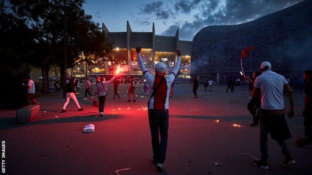 Police are taunted outside Paris St-Germain's stadium