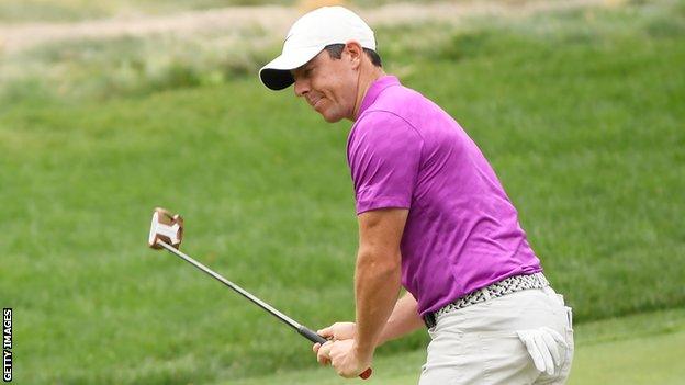 Rory McIlroy watches a putt slide by on day one at the Zozo Championship