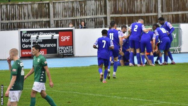 Uxbridge celebrate a goal