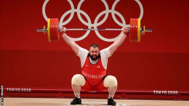 Georgia's Lasha Talakhadze in weightlifting action on his way to gold at Tokyo 2020