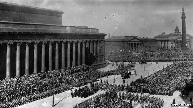 Soldiers march outside St George's Hall