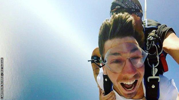 Cameron Norrie skydiving