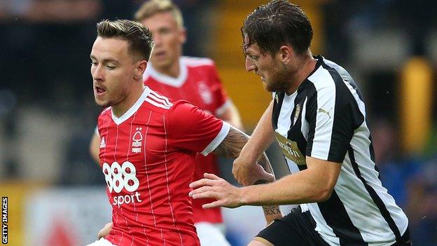 Barrie McKay of Nottingham Forest is challenged by Matt Tootle of Notts County during a pre-season friendly