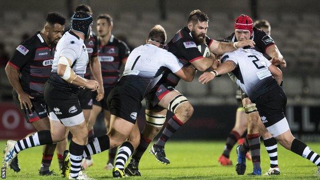 Edinburgh's Cornell Du Preez (centre) is tackled by Oliviero Fabiani (2) and Andrea Lovotti