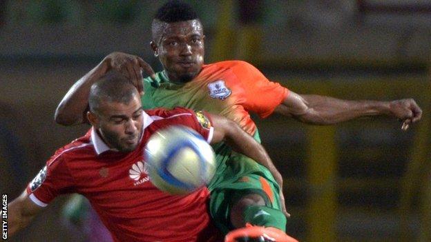 Zesco United defender Adama Ben Bahn (right) in action against Al Ahly