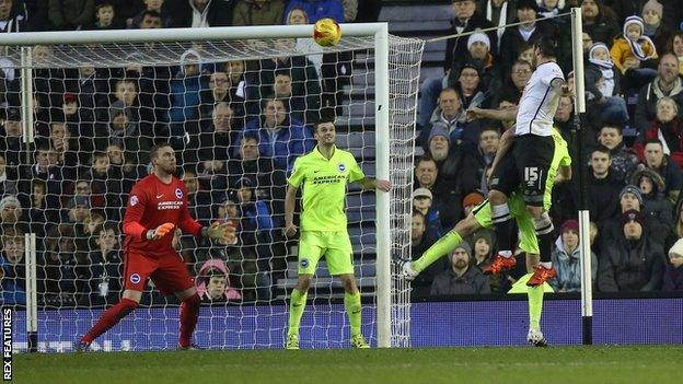 Bradley Johnson heads in Derby's first-half equaliser against Brighton