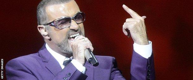 George Michael sings