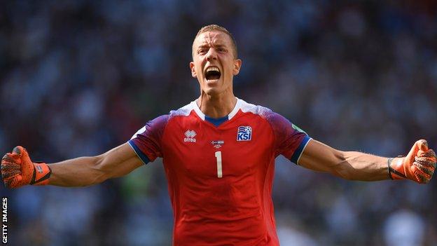 Hannes Halldorsson celebrates Iceland's first ever World Cup point