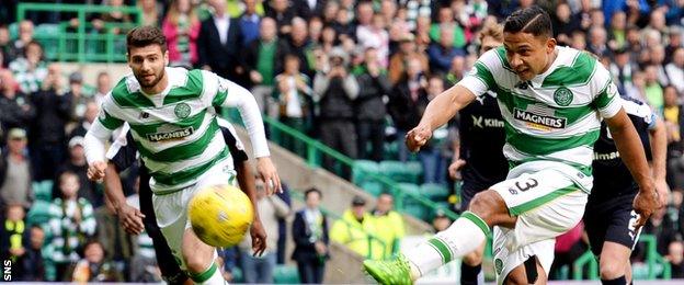 Emilio Izaguirre blasts his penalty kick over the bar