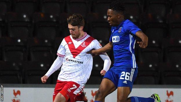 Airdrie's Craig Thomson (L) and Cove's Kieran Ngwenya during a Scottish Championship play-off semi final second leg match between Airdrieonians and Cove Rangers at the Penny Cars Stadium, on May 11, 2021