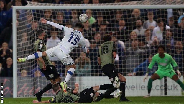 Josh Hawkes scores Tranmere's first goal against Colchester