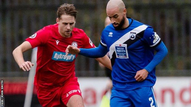 Bala's Dave Edwards in action against Jazz Richards of Haverfordwest