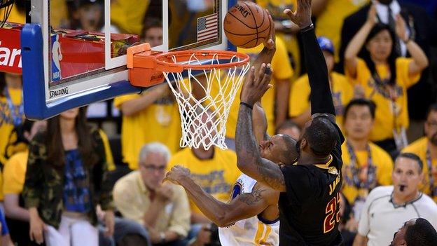 LeBron James blocks Andre Igoudala to seal a 3-1 come back