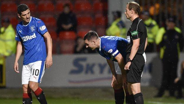 Rangers midfielder Graham Dorrans and captain Lee Wallace