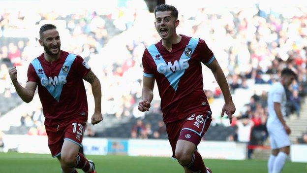 Alex Jones (right) celebrates scoring for Port Vale