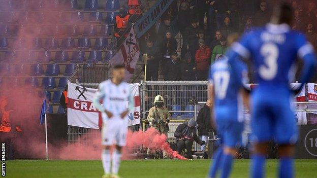 A flare was thrown on the pitch at Genk's Cegeka Arena