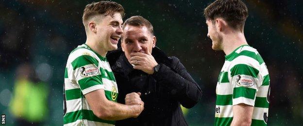 James Forrest (left) and Brendan Rodgers (centre)