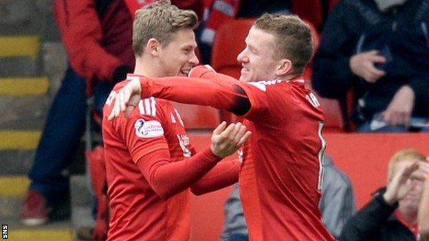 Aberdeen's Simon Church and Jonny Hayes celebrate