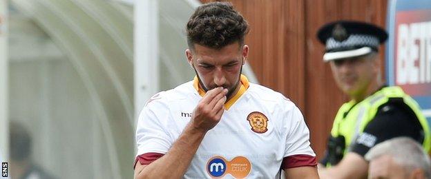 Lee Lucas goes off injured with Motherwell