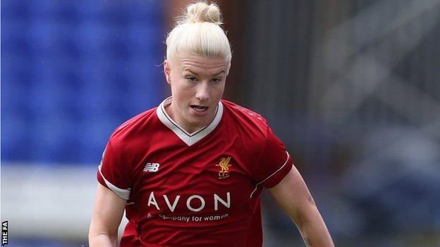 Liverpool's Bethany England runs for the ball