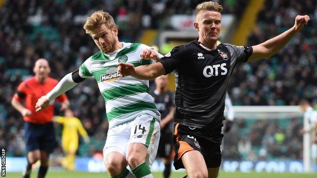 Celtic's Stuart Armstrong (left) battles for the ball against Kilmarnock's Mark O'Hara