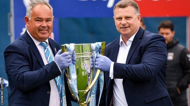 Dave Boddy (left) helped celebrate Coventry's promotion back to English football's second tier with Sky Blues manager Mark Robins in June