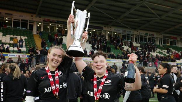 Rosie Galligan and Hannah Botterman with a trophy